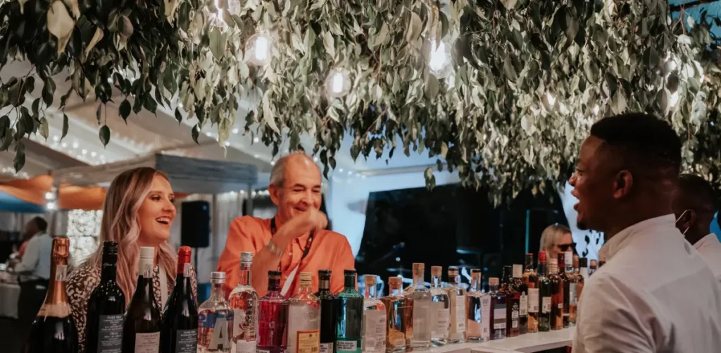 People enjoy waterfront cocktails at the Pure Africa Eatery.