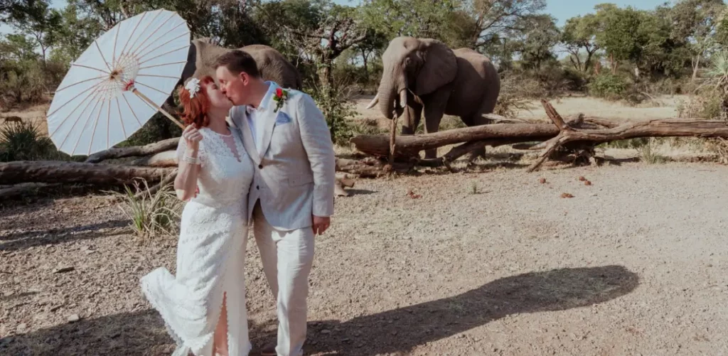 A couple enjoy their luxury guided tour on their wedding day at Victoria Falls by Pure Africa.