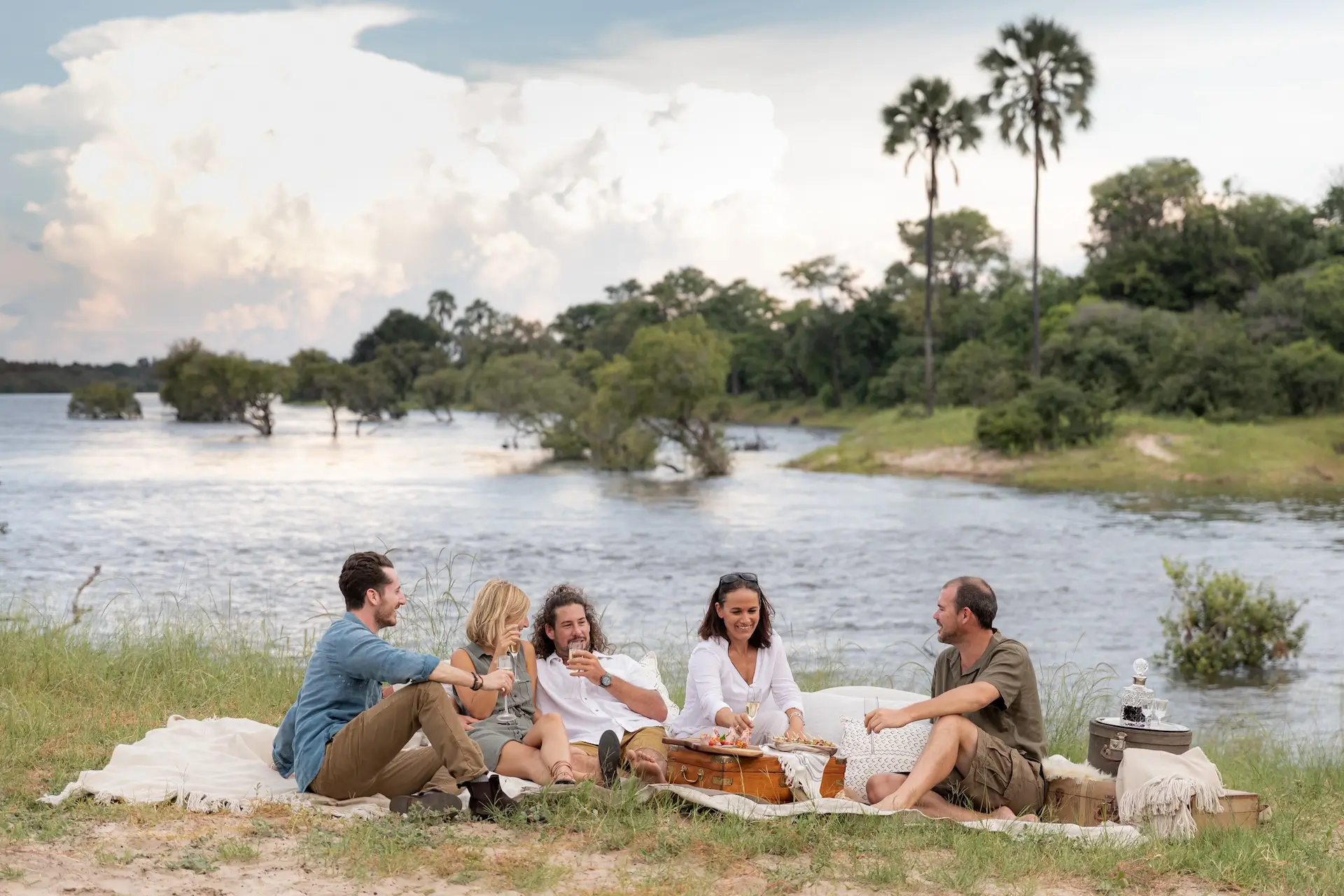 Pure Africa guests enjoy a picnic at Victoria Falls, best time of year.
