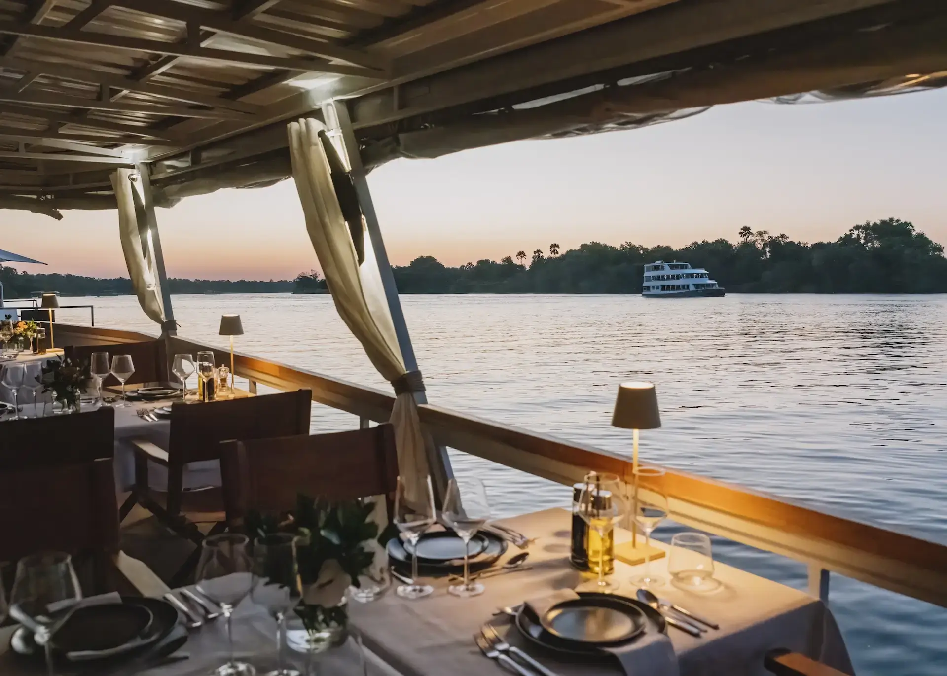 Pure Africa's classic dinner cruise in the evening on the quiet Zambezi River.