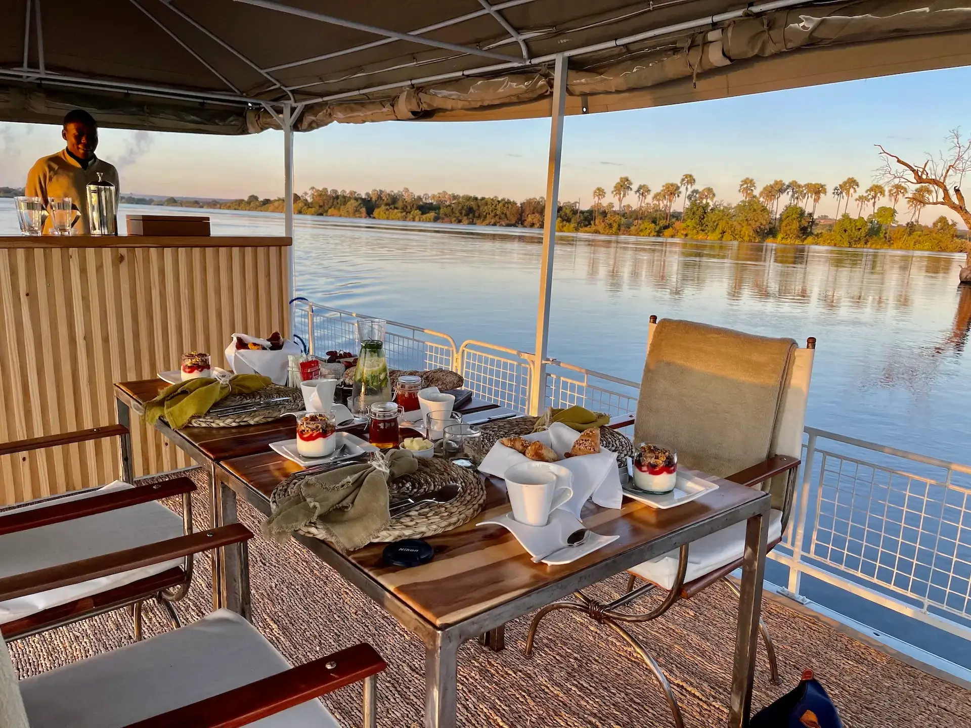 Private sunrise Victoria Falls dining experience on board Pure Africa's Kalunda boat.